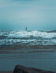 stormy sea with waves and distant buoy